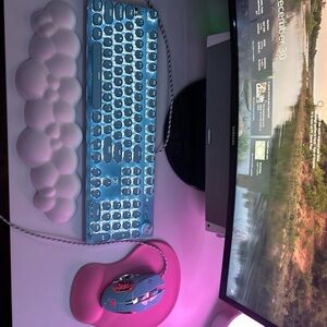 Blue typewriter keyboards and mouse